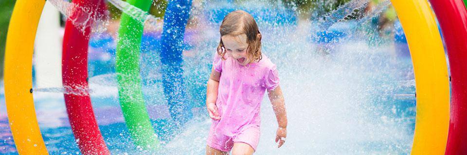 Little girl at a water park in Isle sur la Sorgue