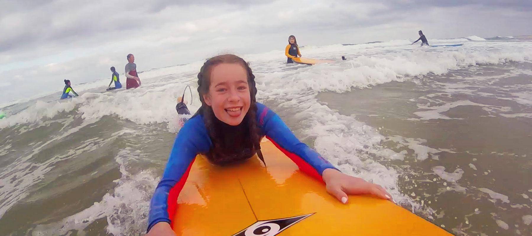 Blogger Jenography's daughter Lillian surfing in Moliets