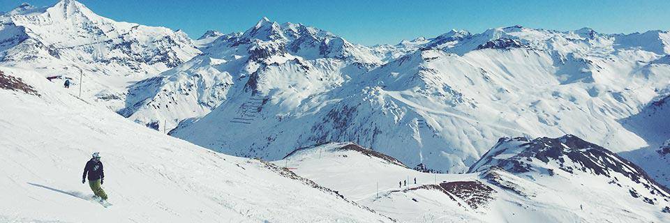 Snowboarder in a stunning French Alp vista