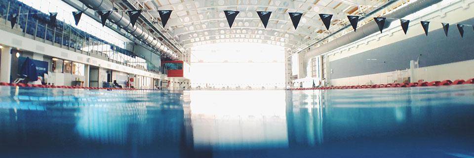 Large swimming pool is empty and calm